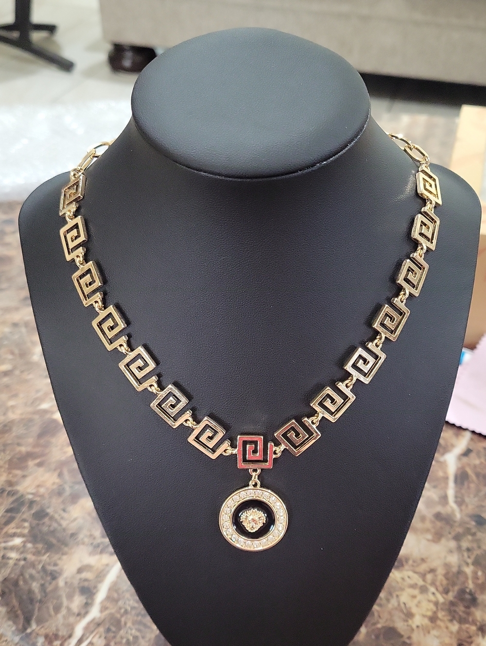 Gold Greek Key Pendant Necklace with Black Enamel Accent